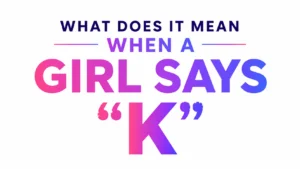 Graphic with bold gradient text on a light gray background reading: “WHAT DOES IT MEAN WHEN A GIRL SAYS ‘K’”. The words “GIRL SAYS” and the large letter “K” are styled in pink-to-purple-to-blue gradients, with quotation marks around the “K”.